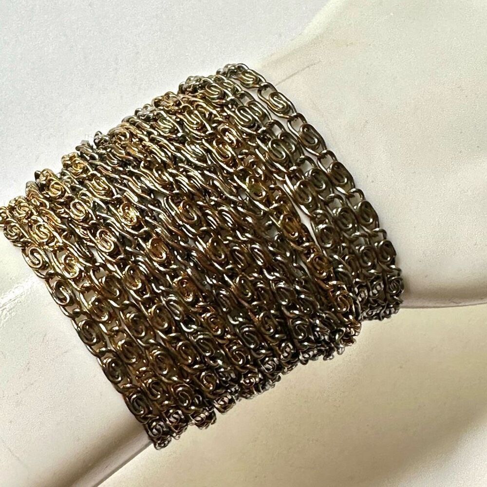Gold and silver tone multi strand chain bracelet
